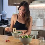 Sarah of plantbaes with a bowl of miso noodle soup