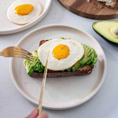 Vegan fried 'egg' made with plant-based ingredients, resembling a traditional fried egg.