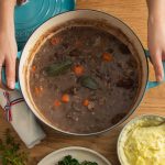 Vegan bourguignon with hearty vegetables and rich red wine sauce