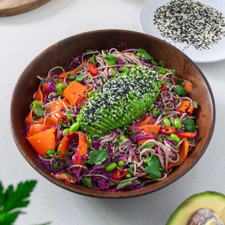 vibrant salad bowl with avocado, carrot and colorful veggies