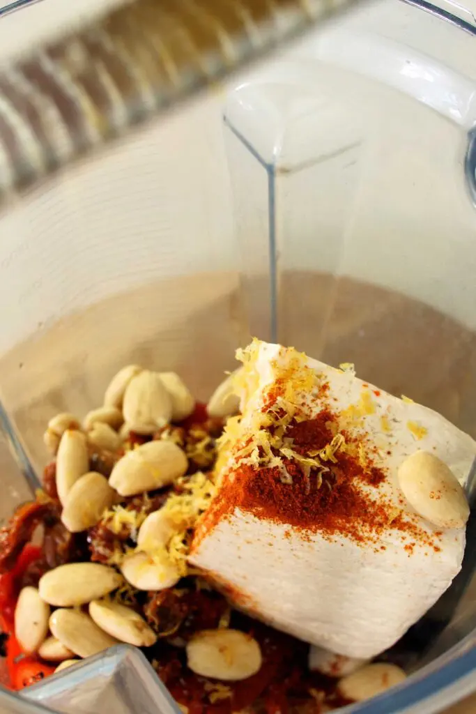 The Romesco pasta sauce ingredients inside the blender