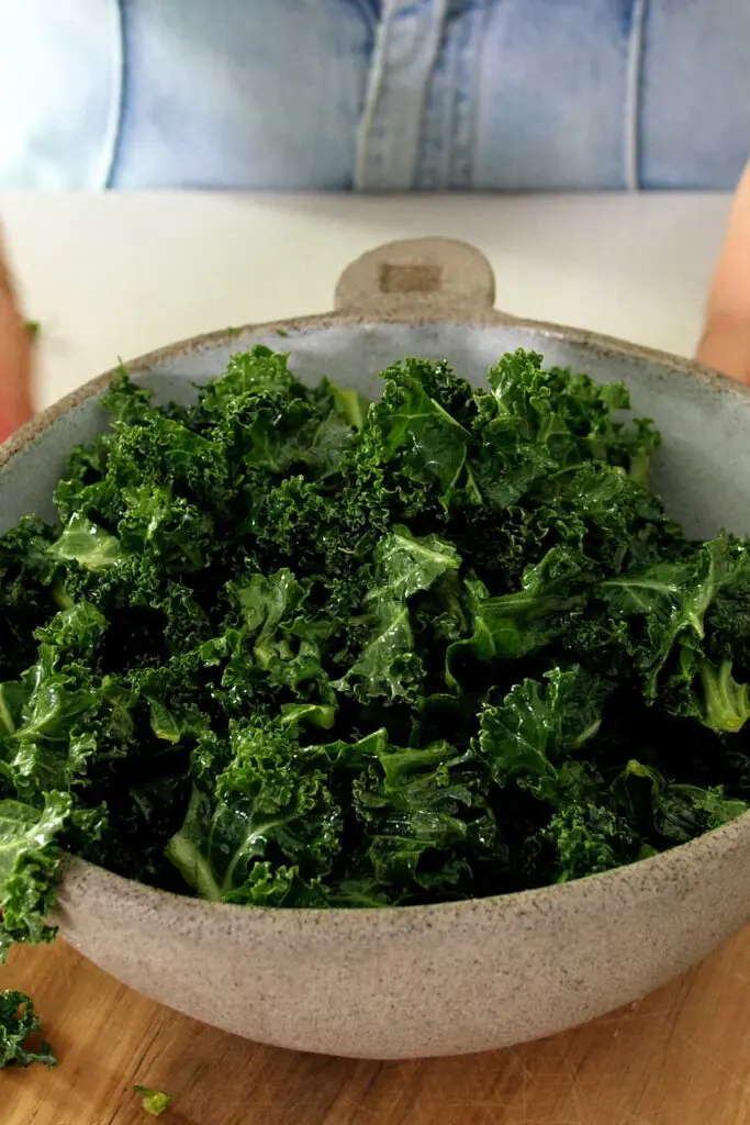 Massaging the kale with olive oil and salt