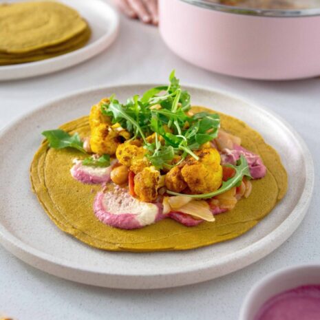 Turmeric Quinoa Wraps with beetroot hummus and roasted cauliflower toppings
