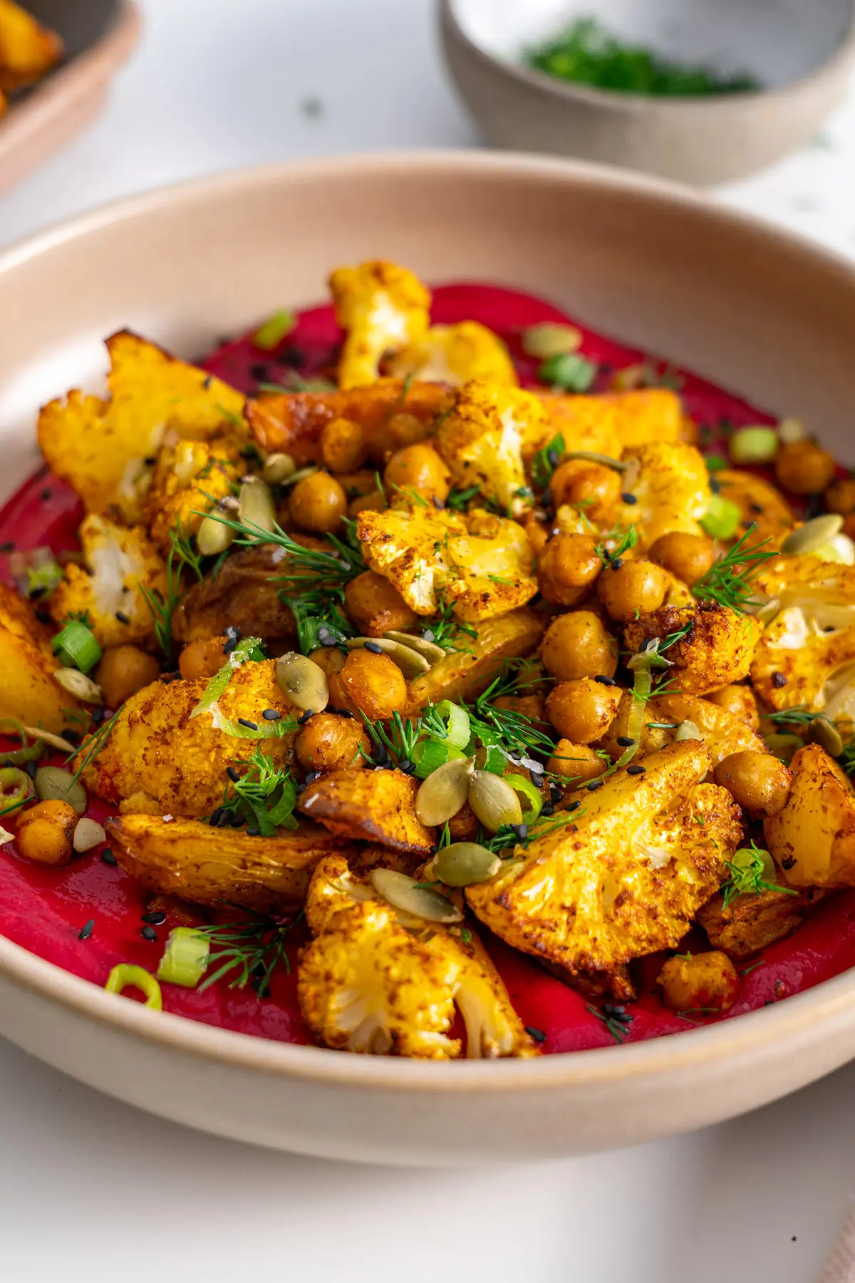 Close-up of a high-protein beetroot bowl highlighting the textures and colors.