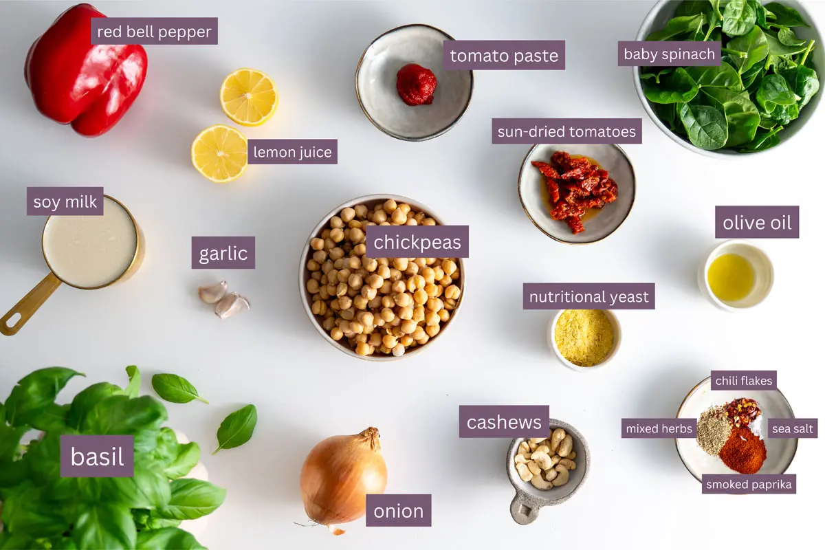 Vibrant ingredients for Marry Me Chickpeas on a white surface.