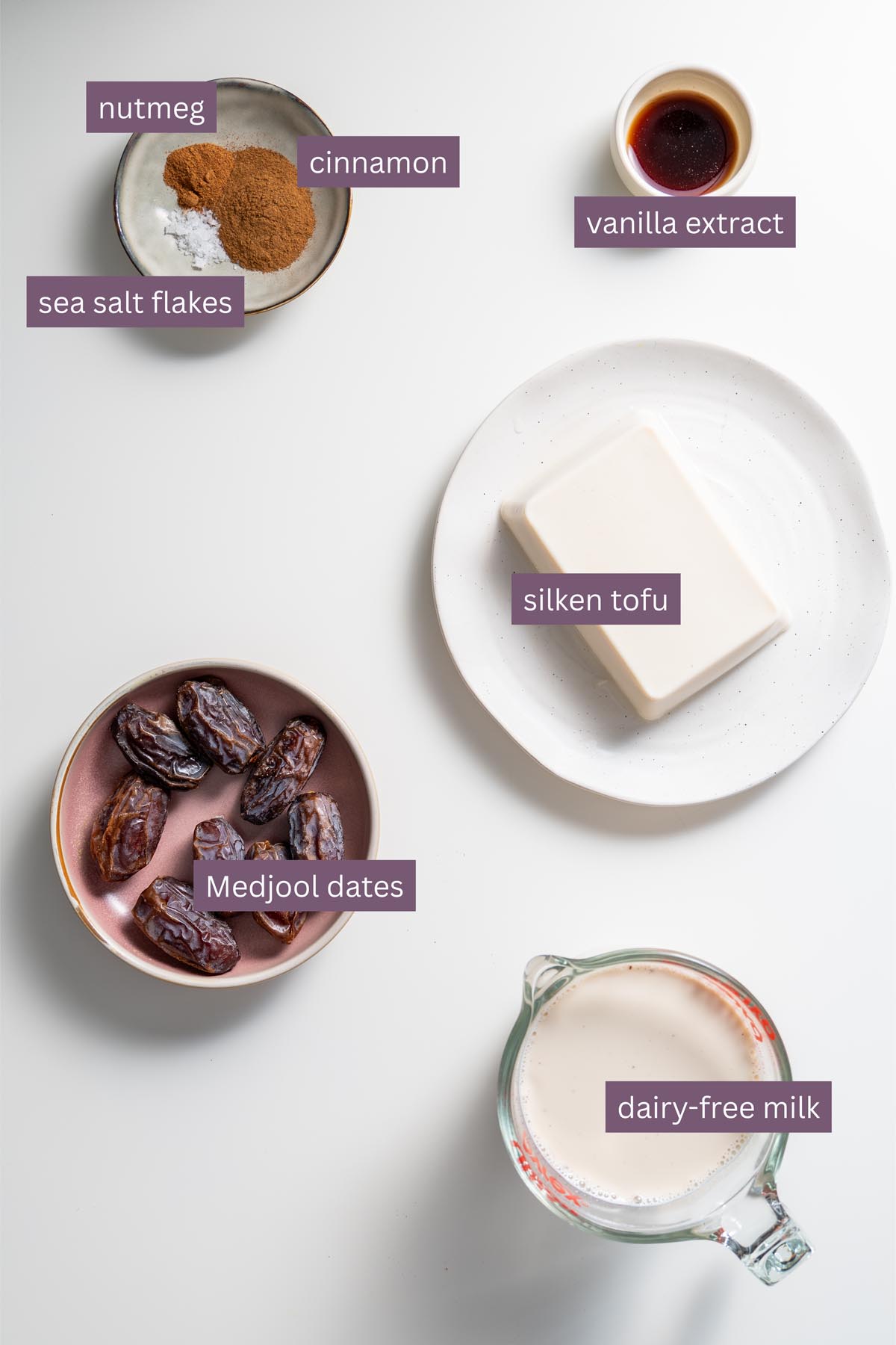 Silken tofu for apple pie baked oats on a white surface.