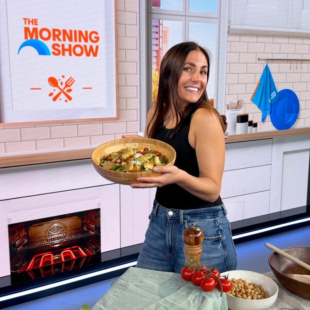 Sarah Cobacho holding crispy potato salad on The Morning Show