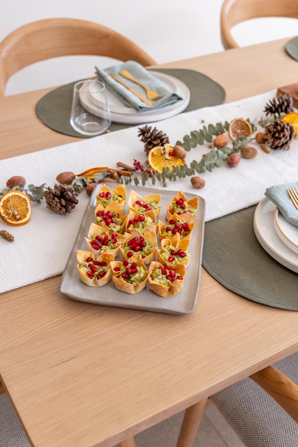 Crispy Wonton Guacamole Cups served on a platter on a holiday table