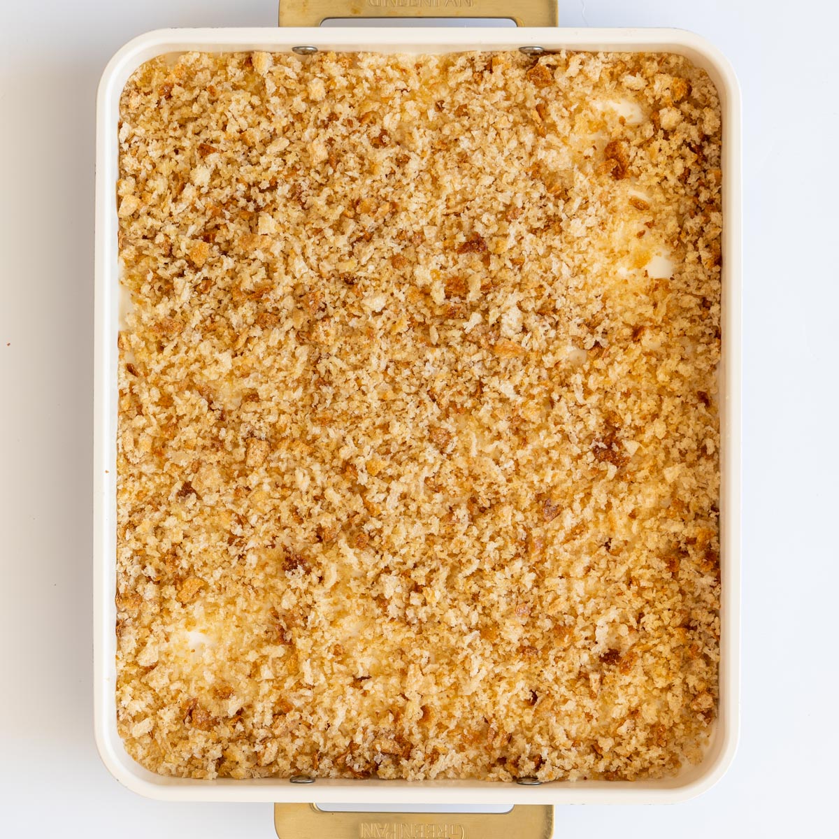 A baking dish filled with freshly toasted homemade sourdough breadcrumbs
