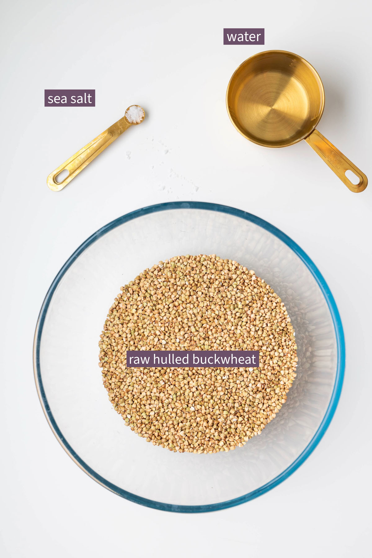 Ingredients for buckwheat bread on a white backdrop