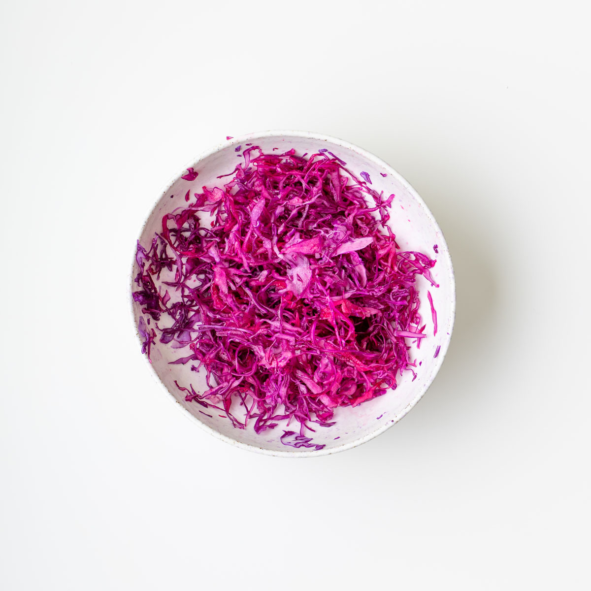 Turmeric quinoa and edamame salad with creamy almond satay dressing and fresh scallions