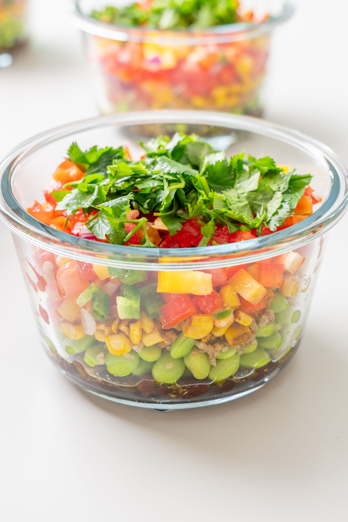 Quinoa being prepared for Cowboy Caviar-inspired salad meal prep.