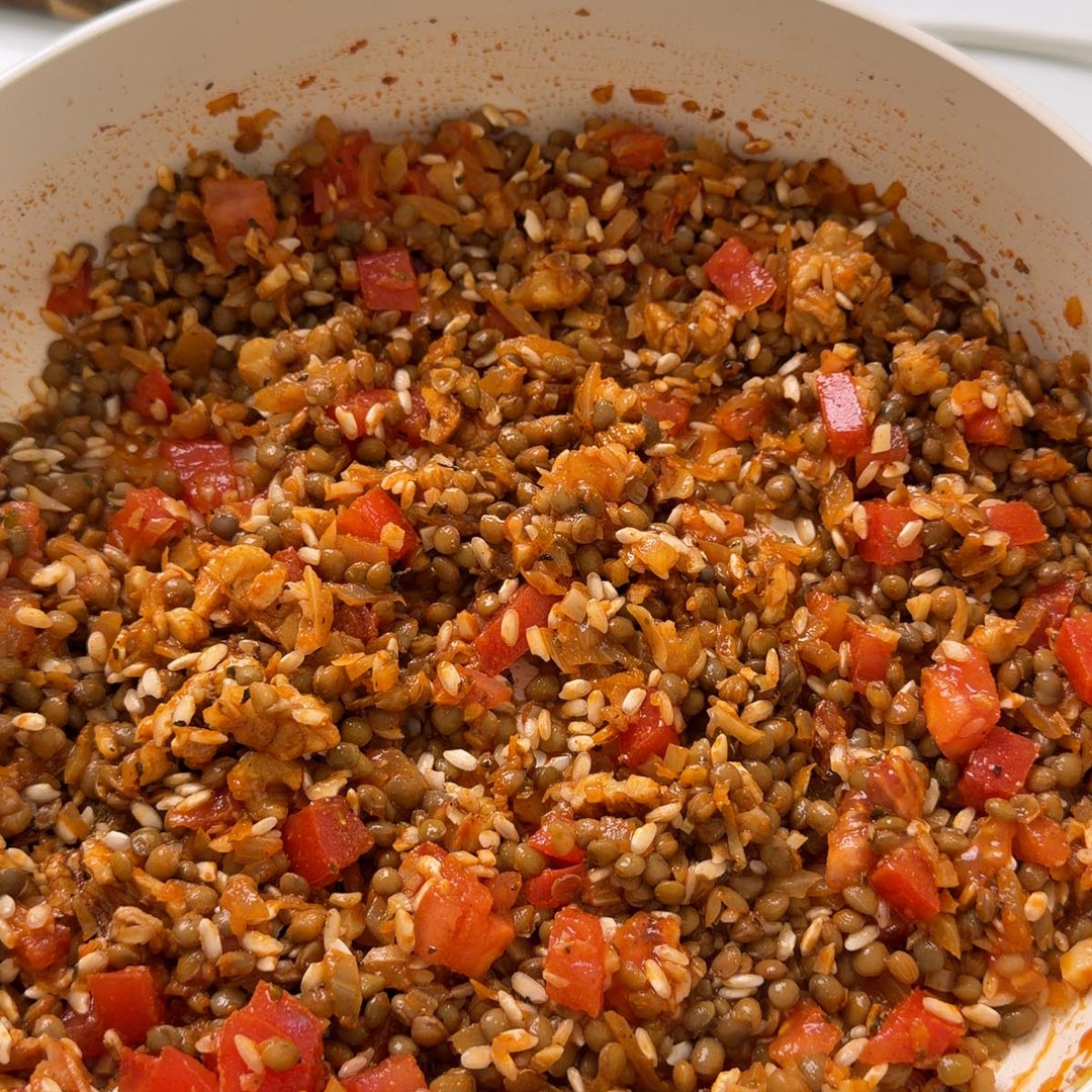 the cooked lentil, rice and walnut filling in a pan.