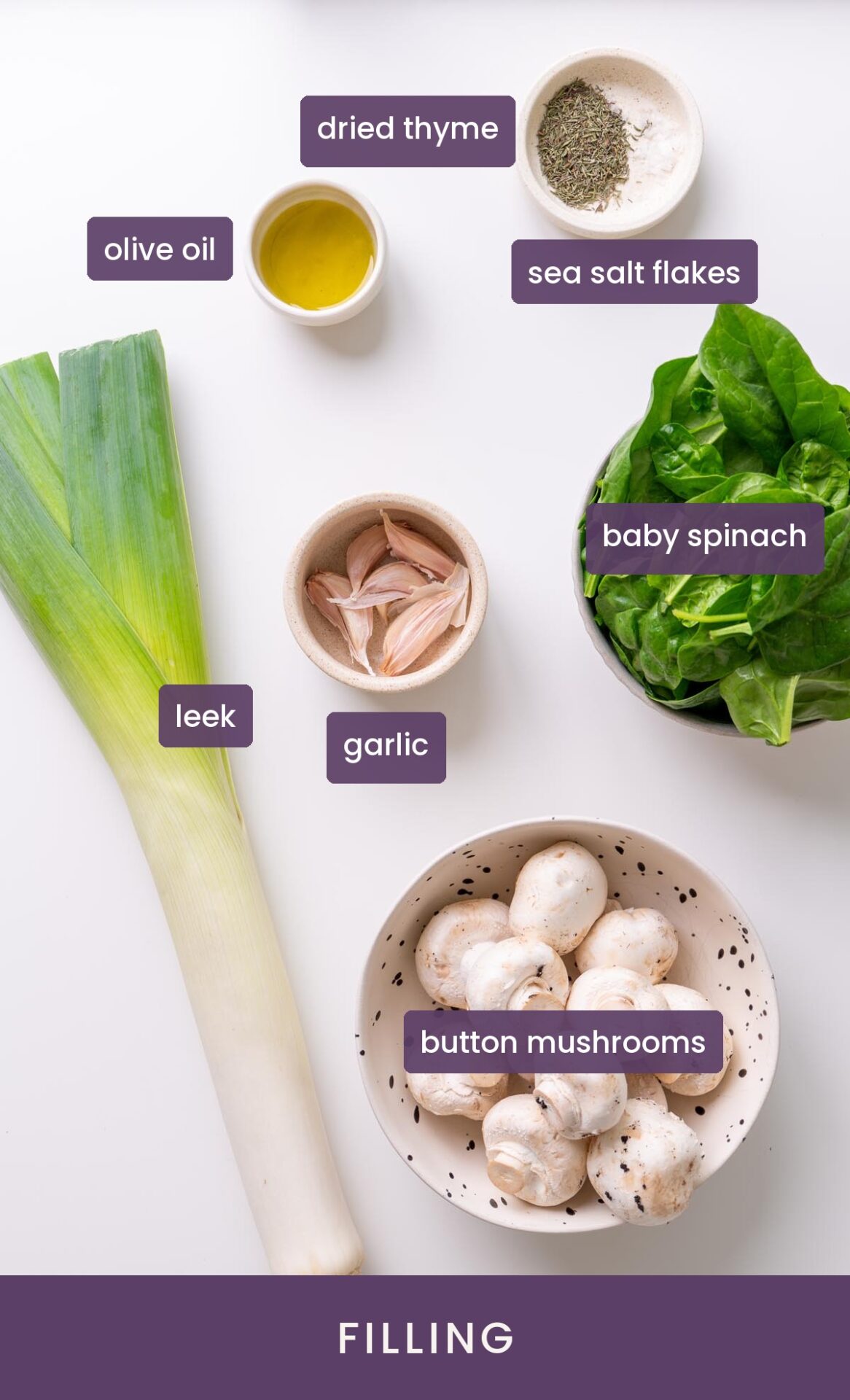 vibrant ingredients for a vegan potato crust quiche on a white surface.